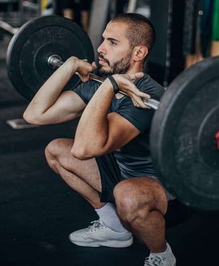 A man performs a lift with proper form