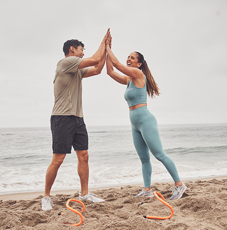 2 Trainers High Fiving