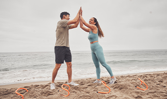 2 Trainers High Fiving