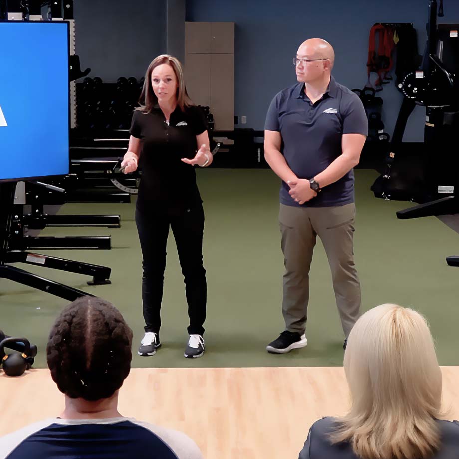 male and female trainer teaching a class