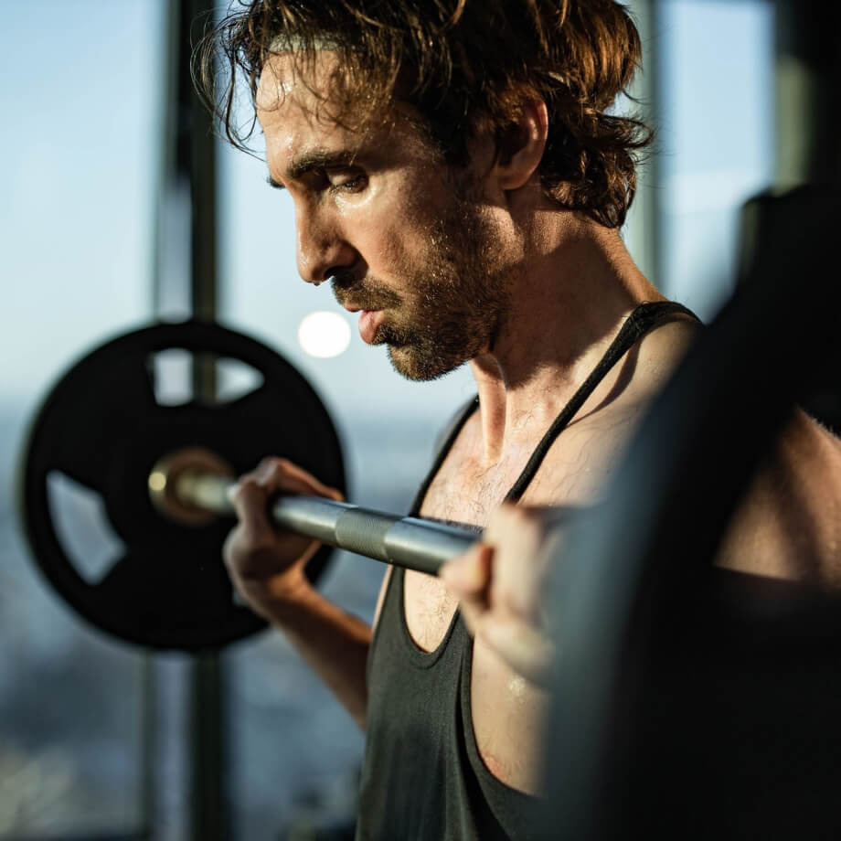 A man lifting a barbell